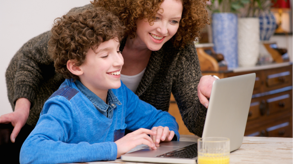 a child being taught by a teacher